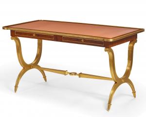 M.E. Dupont gilt bronze mounted amboyna bureau plat with gilt tooled salmon leather top and drawer linings, with M.E. Dupont plaque to the underside, 30 ½ inches tall (est. $4,000-$6,000).