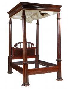 19th century American carved mahogany tester bed having an arched twisted spindle headboard, flanked by turned and octagonal posts, and joined on wood rails (est. $1,000-$2,000).