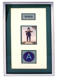 Framed three-star insignia worn by Gen. George S. Patton, Jr. during World War II, plus a photo of Patton when he visited West Point, and a US Third Army shoulder patch (MB: $1,500).