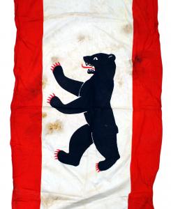 1936 Olympics Berlin Bear street banner measuring 73 inches by 31 inches, with the traditional black standing 23 inch by 12 ½ inch Berlin Bear occupying the center (MB: $250).