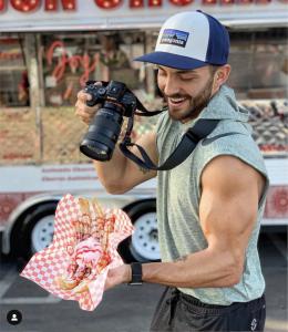 orange county videographer pointing camera at food
