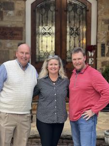 Rick and Karey Kendrick with Co-Founder of Your Home Sold Guaranteed Realty, Todd Walters