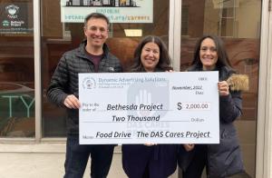 DAS team presenting check for Bethesda Project