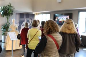 Crowds of people attending the exhibition, experiencing the fascinating world of royal history and culture through the showcased artifacts.
