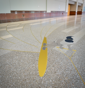 Terrazzo floor depicts a figure water skiing.