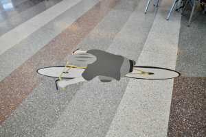 Terrazzo floor depicts a biker.