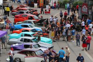 Thousands of classic cars are lined up with throngs of enthusiasts and families to celebrate the American car culture.