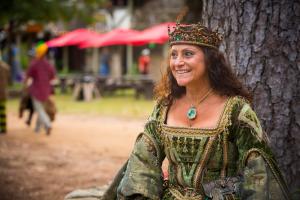 Picture of a woman dressed as a Renaissance queen with the caption: The nation’s largest Renaissance-themed event opens the weekend of October 7-8 with the Queen’s Birthday celebration and the lowest prices of the season – plus free admission for kids.