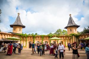 Picture of a Renaissance village scene with the caption: Texas Renaissance Festival, the nation’s largest Renaissance-themed event, opens its 50th Anniversary season on October 12