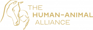 A gold sketch of a woman and a horse. The words "The Human-Animal Alliance."