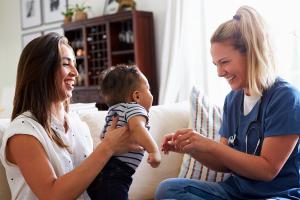 Nurse with mother and child