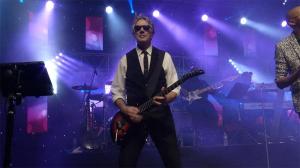 premium party bandleader dennis smith playing guitar