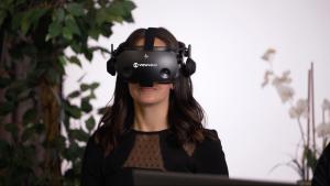 A patient undergoing a neurological assessment using ViewMind's technology and being guided by an assessor