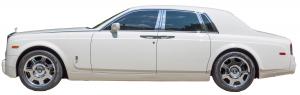 2008 white Rolls Royce Phantom four-door sedan with just 30,732 miles on the odometer and meticulously refurbished to the highest Rolls Royce standards (est. $130,000-$150,000).