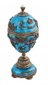 A stunning collection of Faberge items includes this blue guilloche egg by Henrik Wigstrom (1862-1923), mounted with gilt silver, small diamonds and rubies (est. $25,000-$45,000).