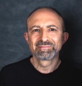 A professional headshot portrait of Presence Training Director and Principal Trainer Daniel Kingsley