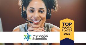 A beautiful, bright-eyed, intelligent young woman wearing a customer service headset flashes a pearly smile.  A white banner contains two logos: one for Mercedes Scientific, and one that says Top Workplaces 2023.