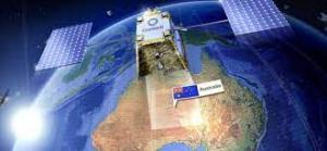 Image shows a satellite in space hovering over Australia