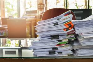 Pile of Papers at desk