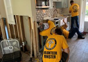 Scientology Volunteer Ministers from Clearwater, Florida, cut out this home’s damaged sheetrock to prevent the growth of mold, removed destroyed carpeting and furniture, and fixed the wiring, making it livable for the residents.