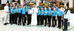 Emaar Entertainment Adventure Park Leadership and team in group photo holding the CAC framed certificate