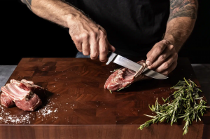 STEELPORT 6" boning knife in-hand cutting lamb chops