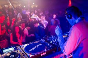 DJ and crowd at the HowTheLightGetsIn festival (the world’s largest philosophy and music festival)
