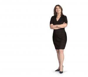 Proven Media, a leading public relations firm specializing in the cannabis industry, has been nominated for the prestigious title of Top PR Firm at the MJ Biz Con's Emjay Awards Kim Prince standing in business attire