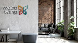 WoodWing Xtendis and ScanSolutions, a Copenhagen-based specialist in document digitization and workflow optimization, have announced a strategic partnership WoodWing logo on wall