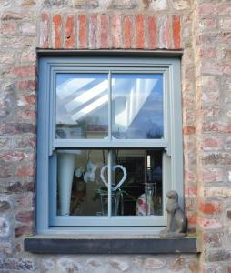 Chart well green upvc sash window
