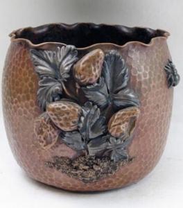Gorham Y50 sterling silver copper jardiniere vase with applied 3-D strawberry plant and spider, having the Gorham date mark for 1911 (est. $2,500-$5,000).