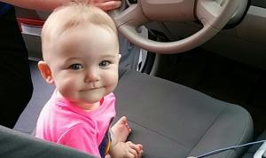 19813433 infant behind the wheel if we