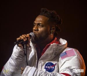 Afrobeats icon Burna Boy brings global rhythms to paradise, headlining the Bahamas' audacious new entrant on the festival scene: Spilligate23.