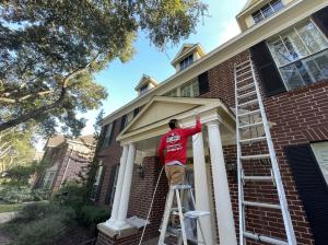 Reliable Roofing company painting