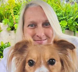 Puzzle Day Founder Jodi Jill with her Rescue Dog June Bug