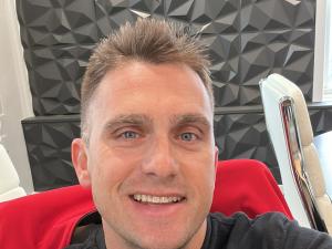 Shane Allyne Close up at office