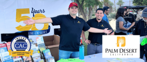 City of Palm Desert staff working an event with a table setup to engage with the community