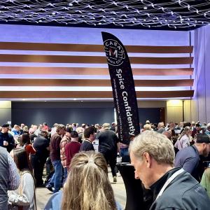 Our Casa M Spice Co® windblade towering 16' above the mixer floor at the opening mixer for the Mid-States show