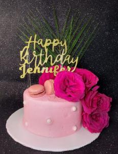 Irresistible Desserts baby pink tropical birthday cake