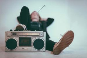 student listening to college radio