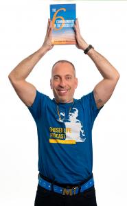 Jonathan A. Hacohen, author and Jewish Buddhist or "JewBu", flaunts his book