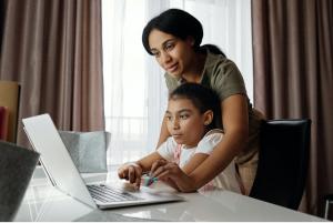 Mother and daughter homeschooling.