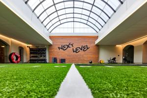 The Houstonian Club, a nationally recognized fitness and wellness facility, is introducing new and innovative ways for its members and registered hotel guests to enhance their overall well-being in the upcoming year indoor turf grass