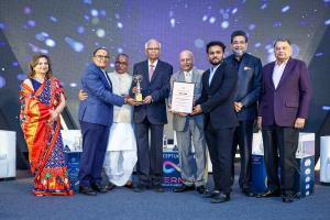 Himmat Kaka and Hitarth receiving the Corporate Leadership Awards 2024