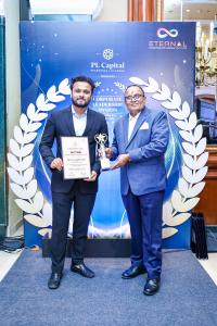 Himmat Kaka and Hitarth after receiving the Corporate Leadership Awards 2024