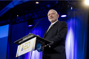 Chairman John Shearer on Stage at 2024 AED Summit