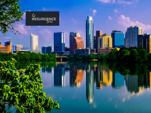 Resurgence Texas logo over austin TX skyline to show concept of drug and alcohol rehab Texas