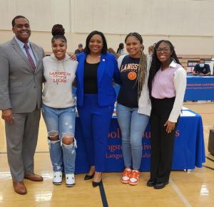 Langston President Jackson poses with the Business School Computer Team