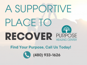 An image shows a man helping another climber to show the concept of addiction recovery with the help of Purpose Healing Center