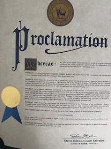 Suffolk County Executive of New York Steve Bellone gives Proclamation Founder of Self-Love Day Danni Benson